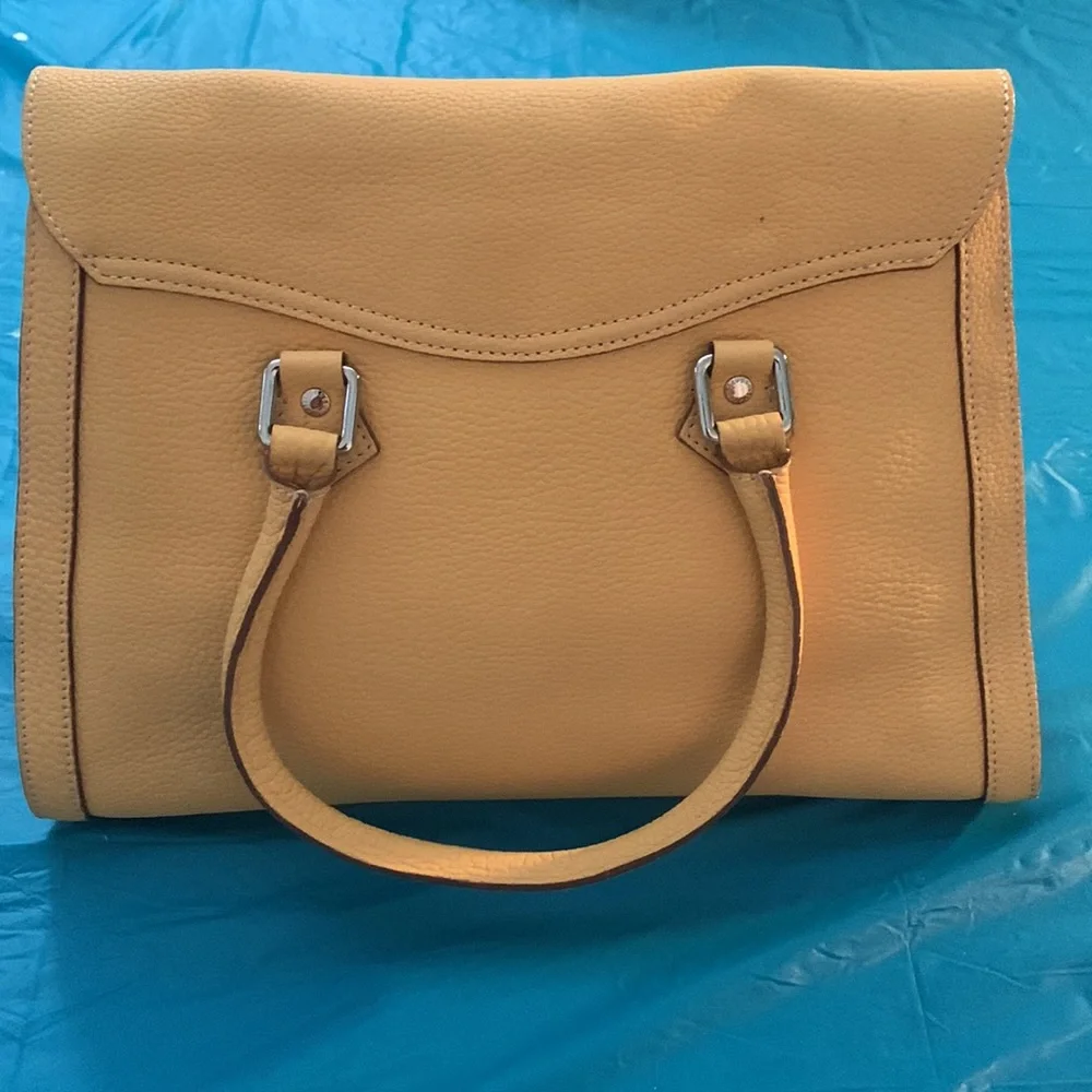 Almost New Dooney and Bourke Satchel with matching wallet. Rich Mustard Color